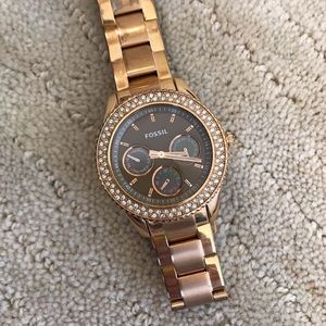 Gold fossil watch